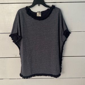 Denim colored oversized top with fringe